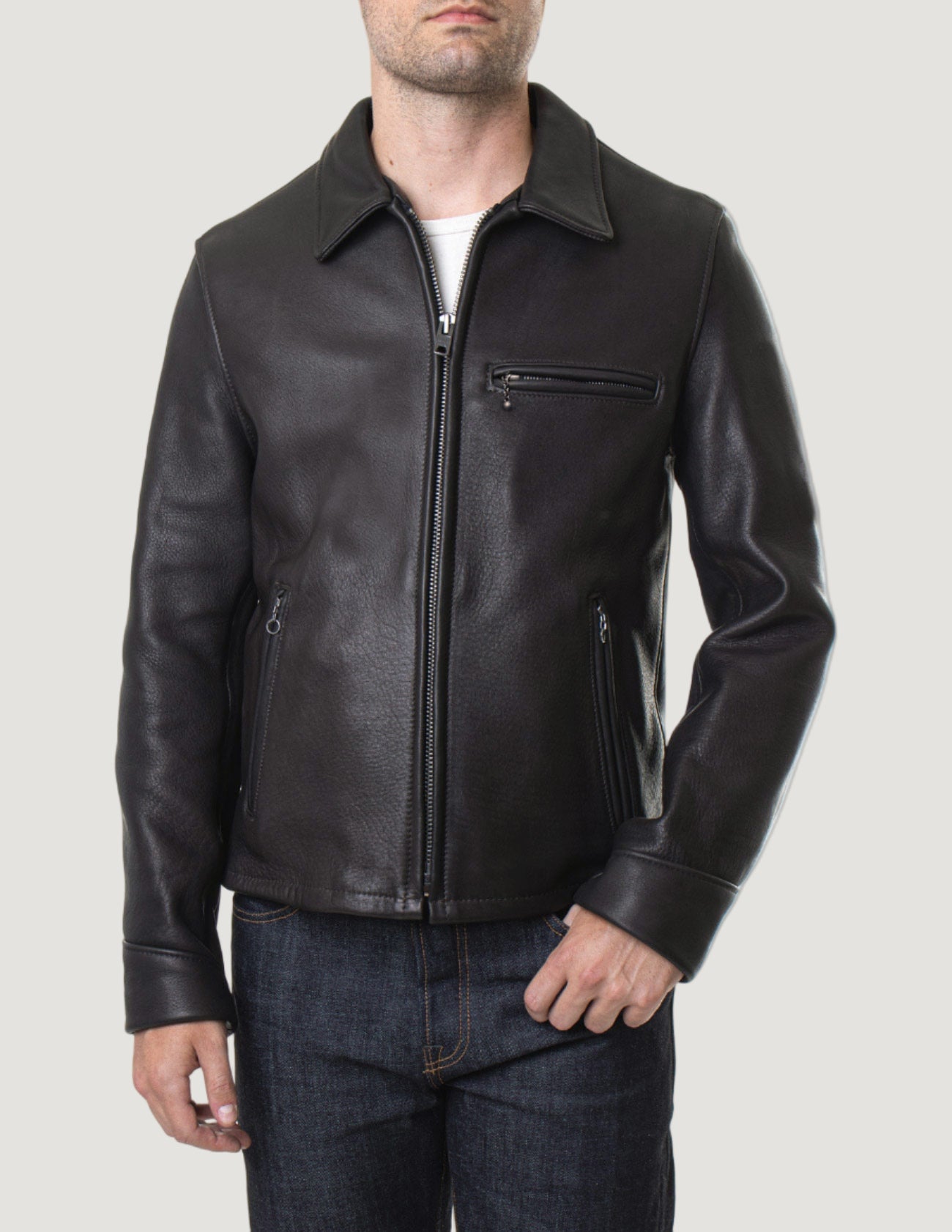 Man wearing a black leather jacket on a white background